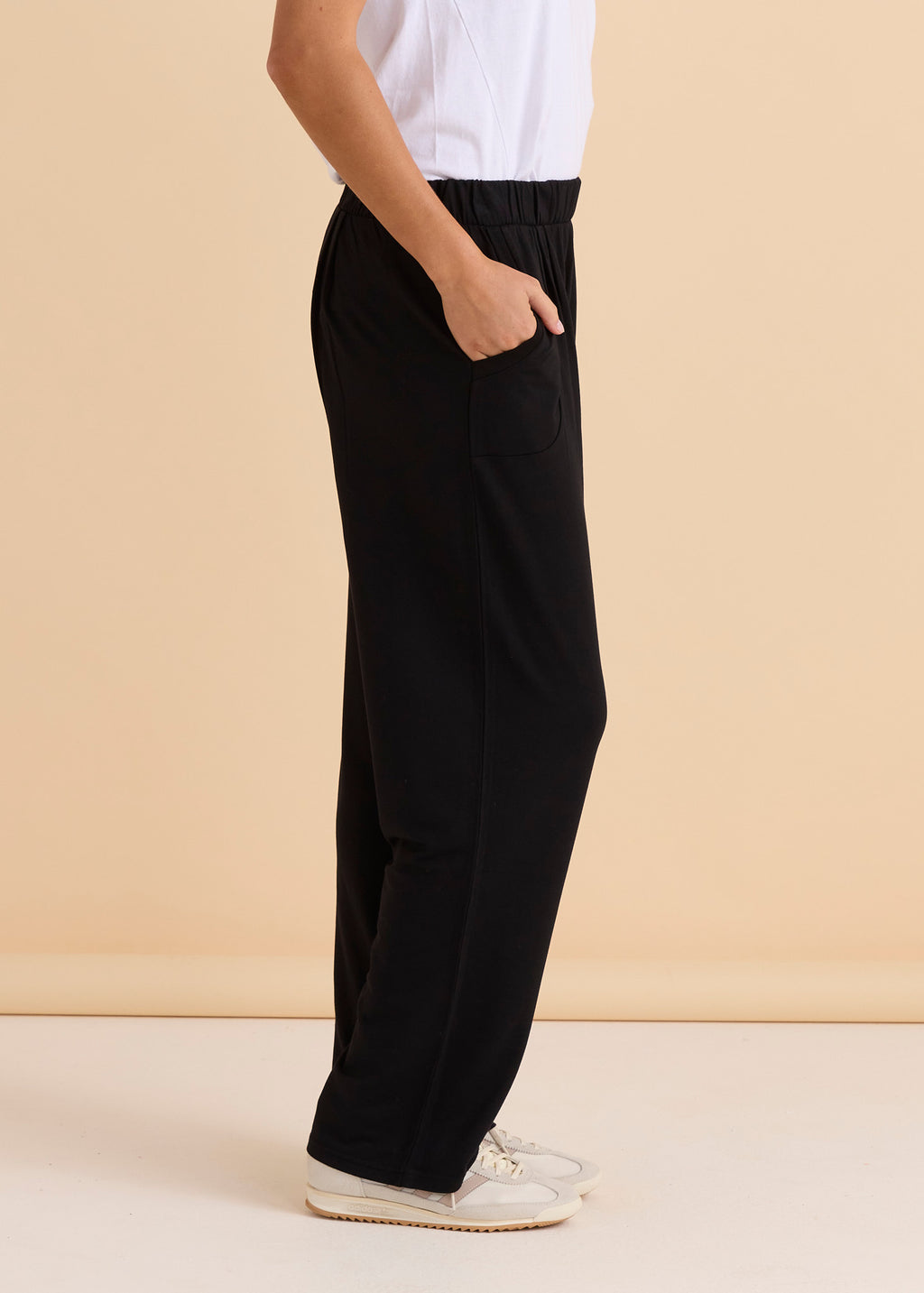 Person wearing black pants and a white shirt on a beige background
Ginnie Bamboo Pant Black