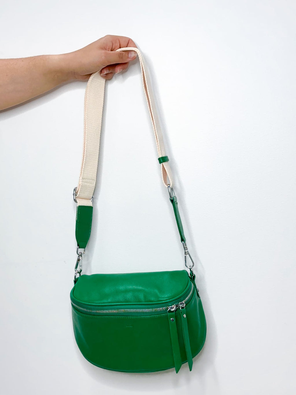 Green handbag with a decorative strap on a light background
Dani Leather Bag Green