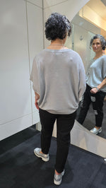 Person wearing a gray sweatshirt and black pants standing in front of a mirror.
Italian Seq Pants Black