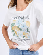 White t-shirt with lemon and floral design and text on a white background
Limoncello Tee Vintage White