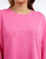 Pink sweatshirt with 'FOXWOOD' logo on a white background
Simplified Crew Bright Pink