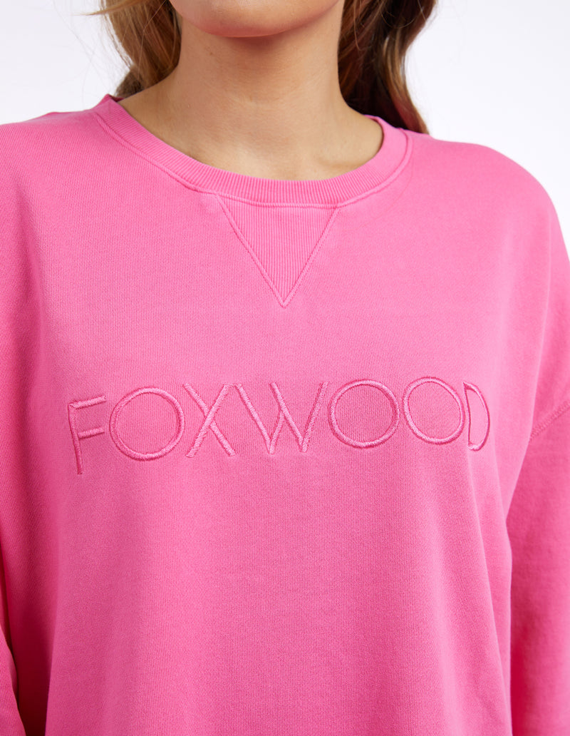 Pink sweatshirt with 'FOXWOOD' logo on a white background
Simplified Crew Bright Pink