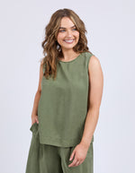 Woman wearing a green sleeveless top and green pants on a white background
Bliss Tank Clover