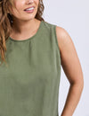 Woman wearing a green sleeveless top against a white background
Bliss Tank Clover