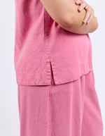 Person wearing a pink outfit with a plain background
Bliss Tank Chateau Rose