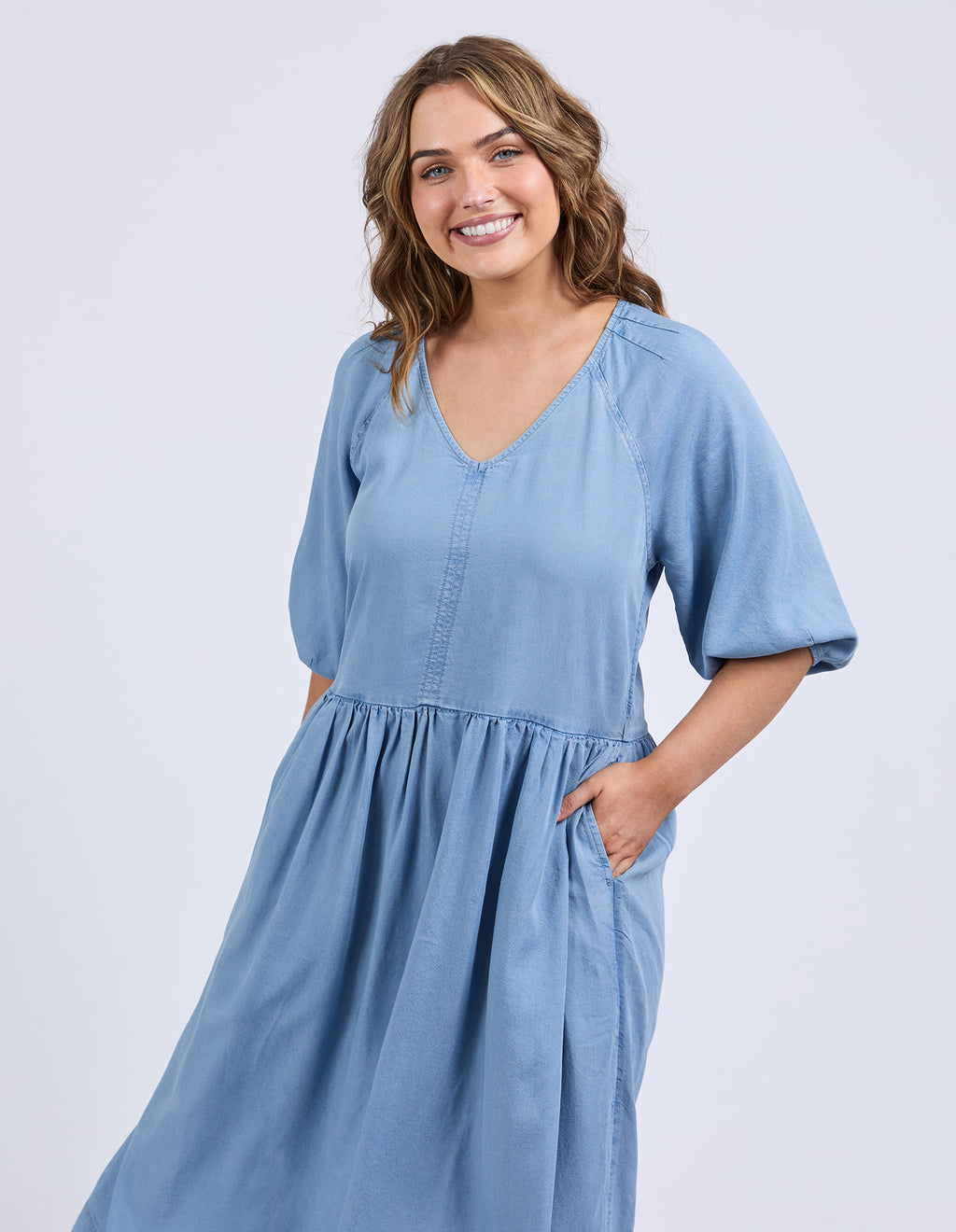 Woman wearing a blue dress on a white background
Sawyer Chambray Dress Blue