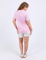 Woman wearing a pink t-shirt and white shorts on a light gray background
Winona Tee Dusk Pink