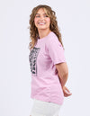 Woman wearing a pink t-shirt with a graphic design on a white background
Winona Tee Dusk Pink