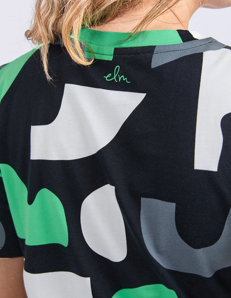 Close-up of a colorful shirt with abstract patterns and brand name on a blurred background
Stijl Dress Charcoal