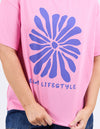 Pink t-shirt with a blue floral design and 'ELM LIFESTYLE' text on a white background
Camelia Tee Chateau Rose