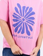 Pink t-shirt with a blue floral design and 'ELM LIFESTYLE' text on a white background
Camelia Tee Chateau Rose