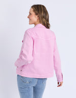 Woman wearing a pink jacket and blue jeans on a white background
Tilly Denim Jacket Dusk Pink