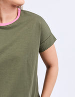 Green t-shirt with pink neckline on a white background
Cooper Tee Clover Green