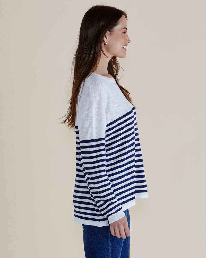 Woman wearing a white and blue striped sweater on a plain background
Natasha Knit Top White/Navy