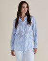 Woman wearing a light blue floral patterned shirt against a beige background
Lace Stripe Shirt Blue