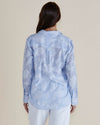 Woman wearing a light blue floral patterned shirt against a beige background
Lace Stripe Shirt Blue