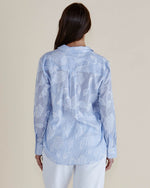Woman wearing a light blue floral patterned shirt against a beige background
Lace Stripe Shirt Blue