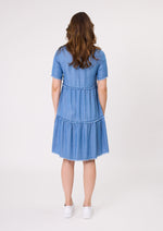 Woman wearing a blue denim dress on a white background
Beatrice Dress Chambray
