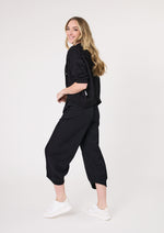 Woman wearing a black jumpsuit on a white background
Bria Jacket Black