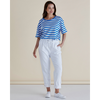 Woman wearing a blue and white striped shirt and white pants against a beige background
Brooks Jean Snow White