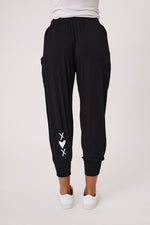 Black jogger pants with a heart and cross design on a white background Signature Print Fresco Pant Black