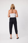 Woman wearing a white top and black pants on a plain background Kylie Side Pocket Pants Black