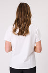 Person wearing a plain white t-shirt on a light gray background In This Together T-Shirt White