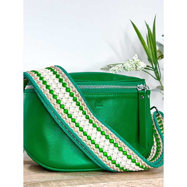 Green handbag with a decorative strap on a light background
Dani Leather Bag Green