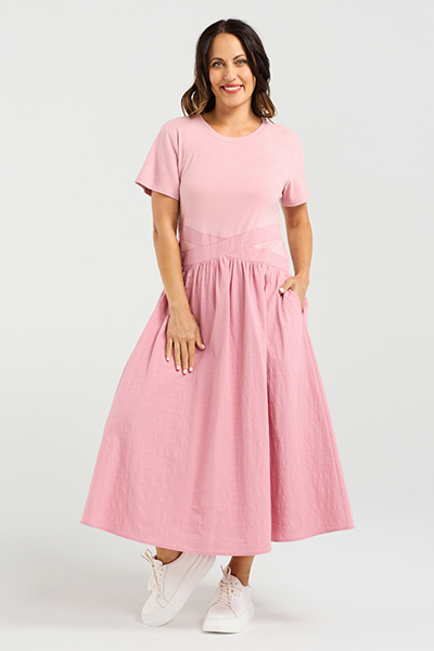 Woman wearing a pink dress on a white background
Delilah Dress Pink