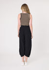 Woman wearing a striped tank top and black wide-leg pants on a white background
Eva Stripe Tank Mocha/Black