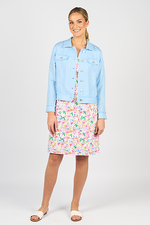 Woman wearing a light blue denim jacket over a floral dress on a white background
Frayed Linen Jacket Sky Blue