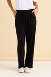 Person wearing black pants and a white shirt on a beige background
Ginnie Bamboo Pant Black