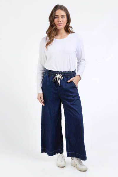 Woman wearing a white top and blue wide-leg pants on a white background
Greta Wide Leg Pants Dark Sapphire