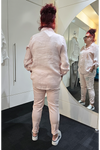 Person wearing a light-colored outfit standing in front of a mirror.
Italian Hey Sequin Shirt Pink