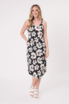 Woman wearing a black floral dress on a white background
Maddie Floral Dress Black/White
