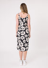 Woman wearing a black dress with white floral pattern on a white background
Maddie Floral Dress Black/White