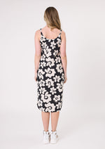 Woman wearing a black dress with white floral pattern on a white background
Maddie Floral Dress Black/White