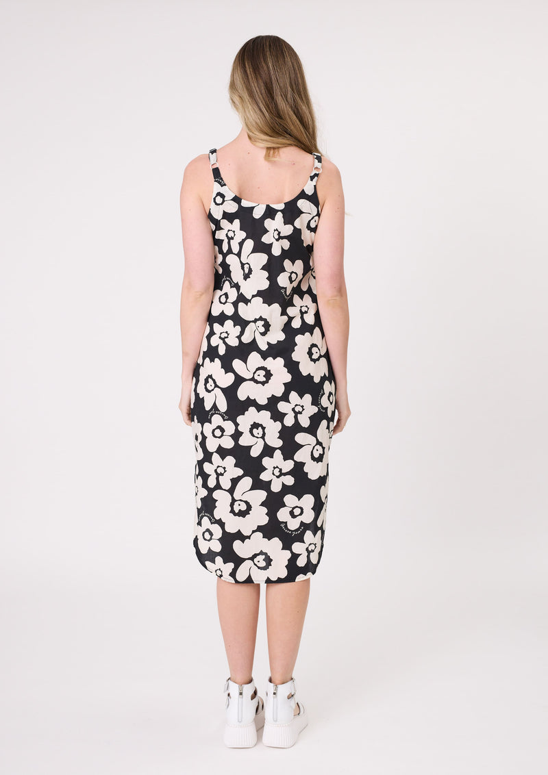 Woman wearing a black dress with white floral pattern on a white background
Maddie Floral Dress Black/White