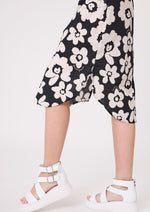Black and white floral skirt worn by a person on a white background
Maddie Floral Dress Black/White