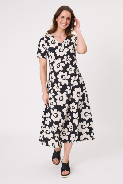 Woman wearing a black and white floral dress on a white background Marta Floral Dress Black/White
