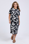 Woman wearing a black dress with white leaf pattern on a white background
Mimosa Tee Dress Black