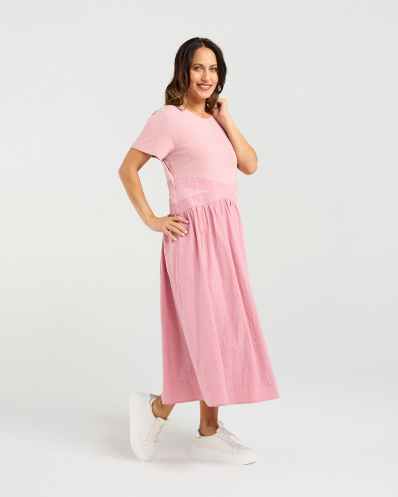 Woman wearing a pink dress on a white background
Delilah Dress Pink