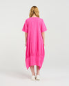 Person wearing a bright pink dress on a white background Selena Dress Hot Pink