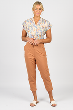 Woman wearing a floral blouse and tan pants on a white background
Skinny Leg 7/8 Pants Spice