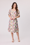 Woman wearing a floral dress on a white background Willow Dress Green Multi