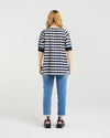 Person wearing a striped shirt and jeans from behind on a white background
Havana Top Navy Check