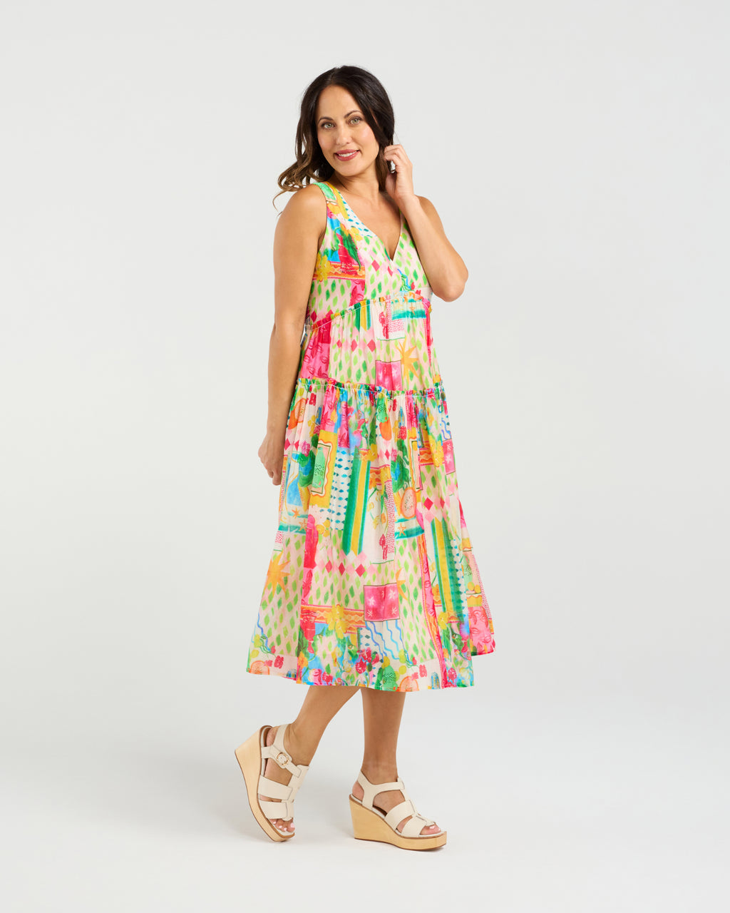 Woman wearing a colorful dress on a white background
Jayla Dress Radiant