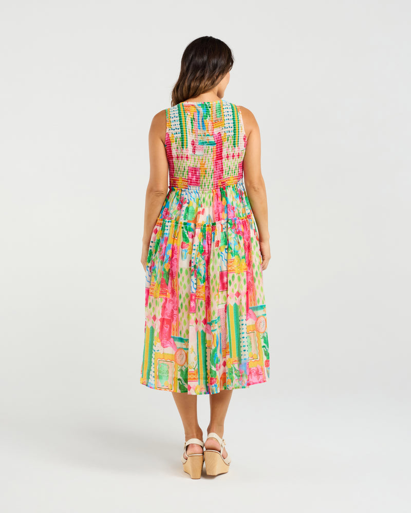 Woman wearing a colorful patterned dress on a white background
Jayla Dress Radiant