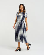 Woman wearing a navy and white striped dress on a white background
Scarlett Dress Navy Check