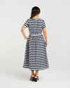 Woman wearing a navy and white striped dress on a light gray background
Scarlett Dress Navy Check